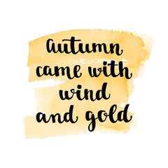 Fall handwritten brush calligraphy and autumn motives. Lettering and hand painted watercolor spot background.