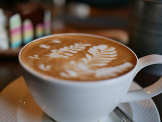 The Texture of Leaf on The Top Hot Coffee Cup.