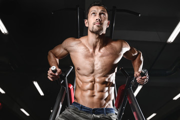 Fototapeta na wymiar man with weight training in gym equipment sport club