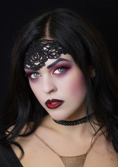 Beautiful witch on Halloween. Witch in the woods. Makeup for vedbmy. Sorcerers.