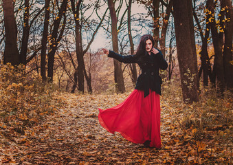 Beautiful witch on Halloween. Witch in the woods. Makeup for vedbmy. Sorcerers.