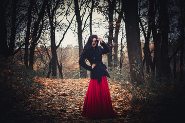 Beautiful witch on Halloween. Witch in the woods. Makeup for vedbmy. Sorcerers.