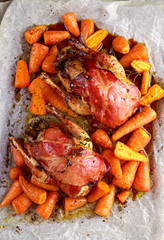 Ready to eat Roast partridges with bacon on crumpled paper.