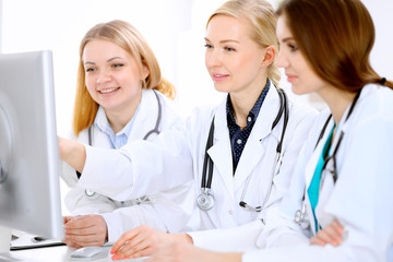 Female doctor leading a medical team at the hospital