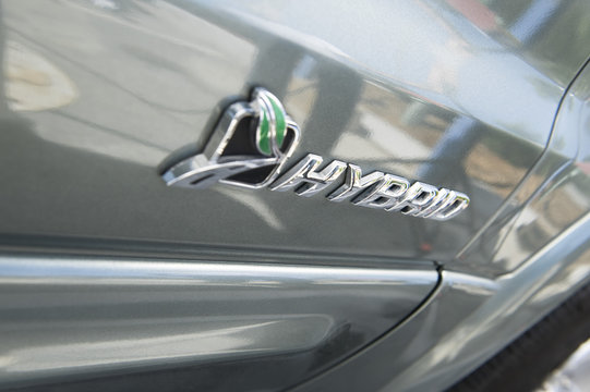 Closeup of sign on hybrid car