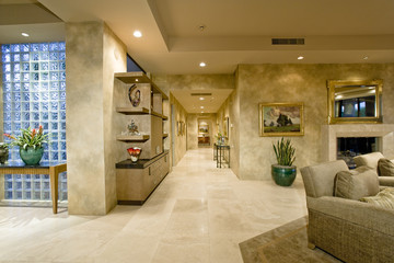 Fototapeta na wymiar Living room with view of narrow hallway in modern house
