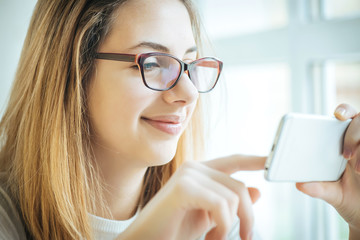 Young woman is surfing the net.