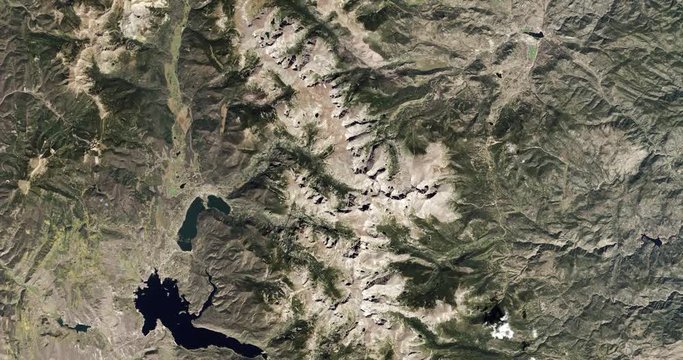 High-altitude overflight aerial of Rocky Mountain National Park, Colorado. Clip loops and is reversible. Elements of this image furnished by USGS/NASA Landsat 