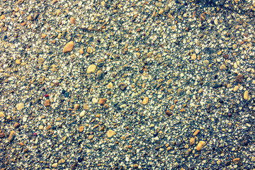 Washed asphalt background. Old white nature asphalt texture pattern or asphalt background for design with copy space for text. Close-up asphalt vintage. Boulders, pebbles washed in asphalt texture.