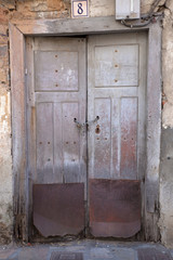 Old door of rural house in Vilafranca del Bierzo