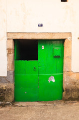 View of old green door