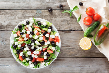 Greek salad and Ingredients, flat lay
