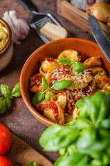 Homemade tortellini with tomato sauce