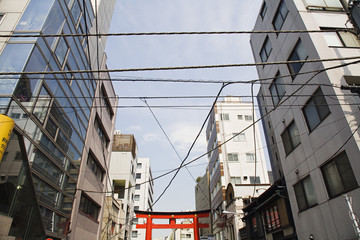 Electrical Lines and Torii Gate Between Multistory Buildings