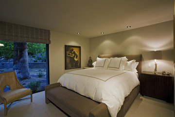 View of a modern and spacious bedroom in a house