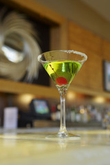 Closeup of a martini on bar counter