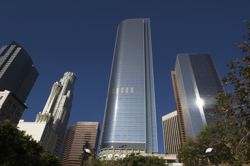 Fototapeta na wymiar Low angle view of tall office buildings at business district, California, USA