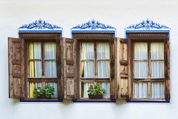 Fototapeta na wymiar Windows of an Old House