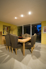 View of chairs around dining table in spacious room