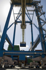 Fototapeta na wymiar Low angle view of dock crane at Limassol Cyprus