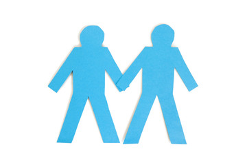 Two blue paper stick figures holding hands over white background