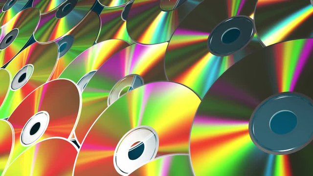 Background From Rotating CD-DVD Discs. 4K. 3840x2160. Seamless Looped  3D Animation.