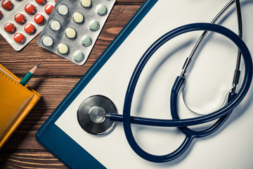 Desk of doctor with medicine things