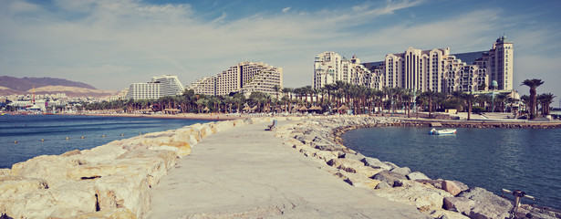 Fototapeta premium Central beach in Eilat – famous resort and recreation town in Israel . Image toned for retro style 