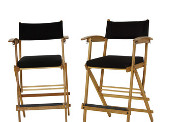 Two empty director's chair over white background