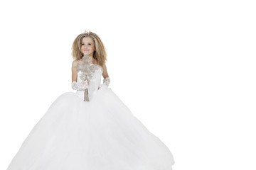 Fototapeta na wymiar Bride girl holding crucifix wearing wedding gown over white background