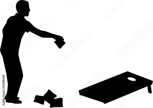 "Man playing Cornhole game silhouette" Stock image and