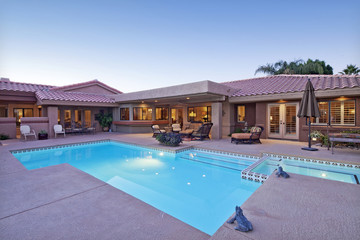 Fototapeta na wymiar Rear view of luxury villa with swimming pool