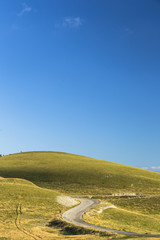 Fototapeta premium Panoramic view of beautiful landscape with Gran Sasso d'Italia peak at Campo Imperatore plateau in the Apennine Mountains, Abruzzo, Italy