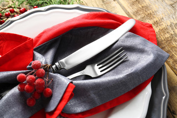 Beautiful Christmas table setting on wooden background