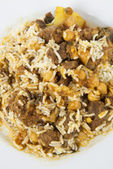 Close-up of rice and meat in plate
