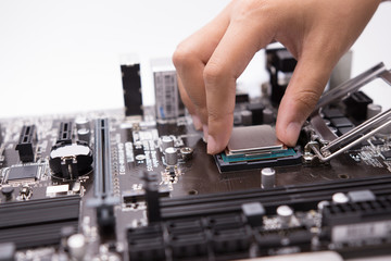 Fototapeta na wymiar Assembling high performance personal computer, inserting CPU, pr