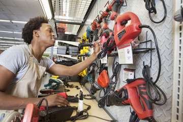 African American man working in an electronics store