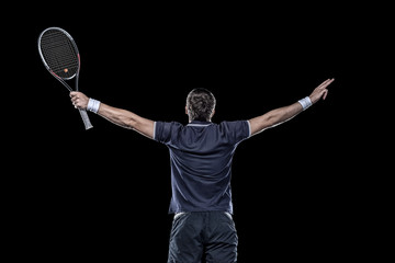 Tennis player with hands up isolated on black