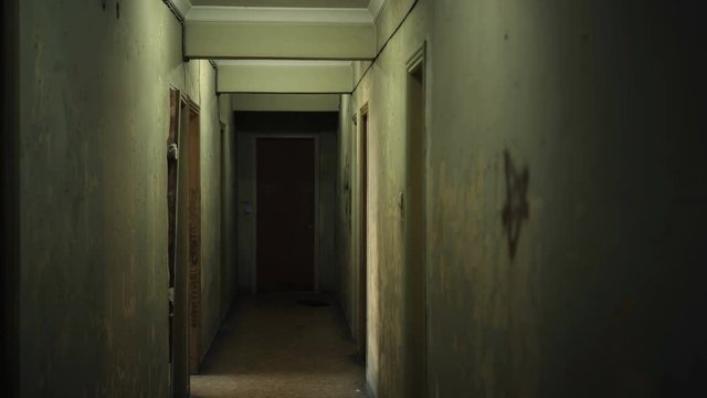 Old Apartment Building Interior With Long And Creepy Dark Hallway.