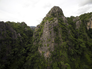 Aerial view of limestone mountain Karst, the Avatar-like mountain pass of sharp cliffs, peak forest and sinkhole landscape made up of carbonate rocks, Devonian limestone