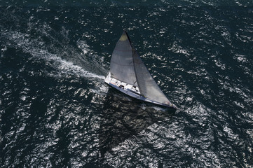 Elevated view of a yacht competing in team sailing event