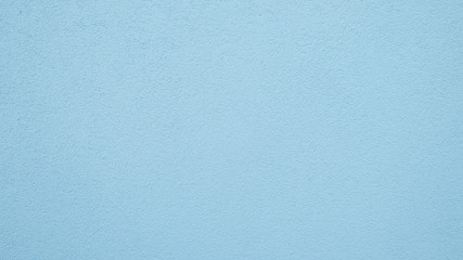 Blaue Mauer mit körnigem Verputz