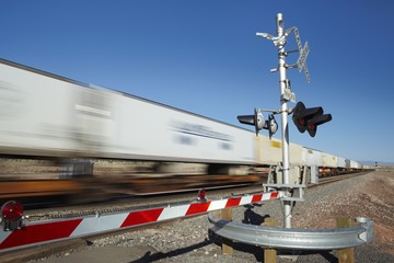 Train passing level crossing motion blur