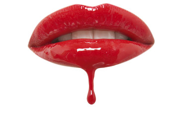 Fototapeta Close-up of red lipgloss dripping from woman's lips over white background obraz