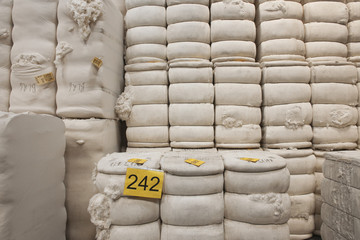 Detail shot of cotton stacked in spinning factory 