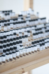 Fototapeta premium Vials in wooden stand at laboratory