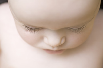 Closeup of baby boy with eyes closed