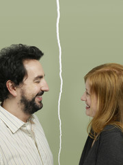 Side view of mid-adult couple facing relationship difficulties