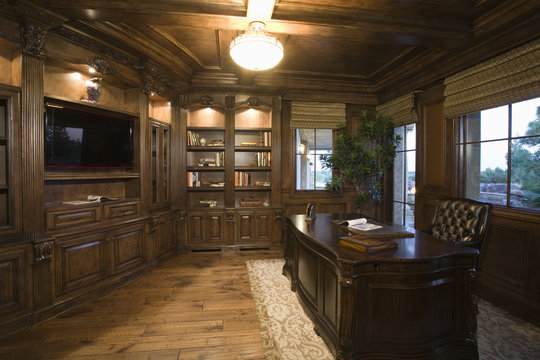 View of a spacious and modern lit study room at house