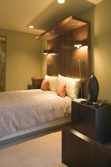 Double bed with oversized wooden headboard